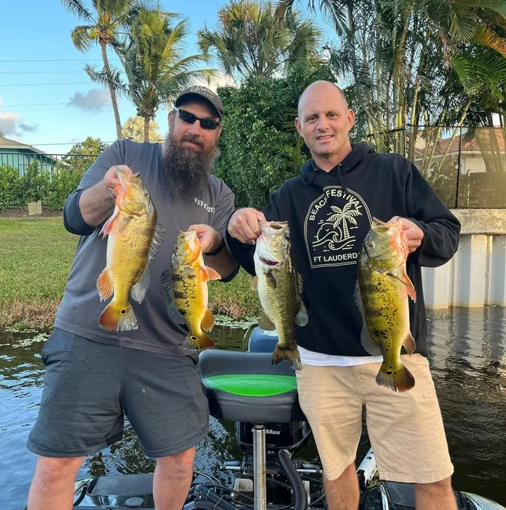 Veterans holding freshwater bass