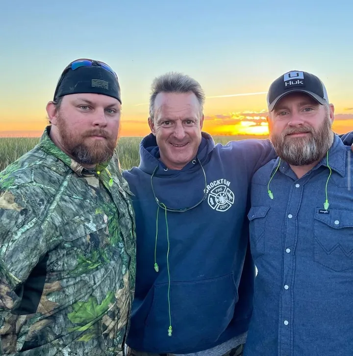 A small group of veterans outdoors