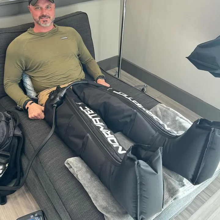 Veteran using compression therapy boots